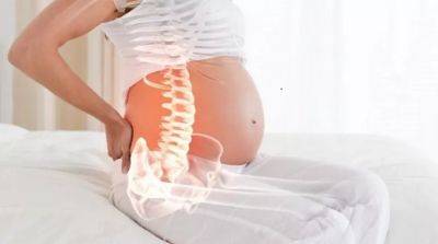 Почему во время беременности болит поясница? - beauty-lady.com.ua